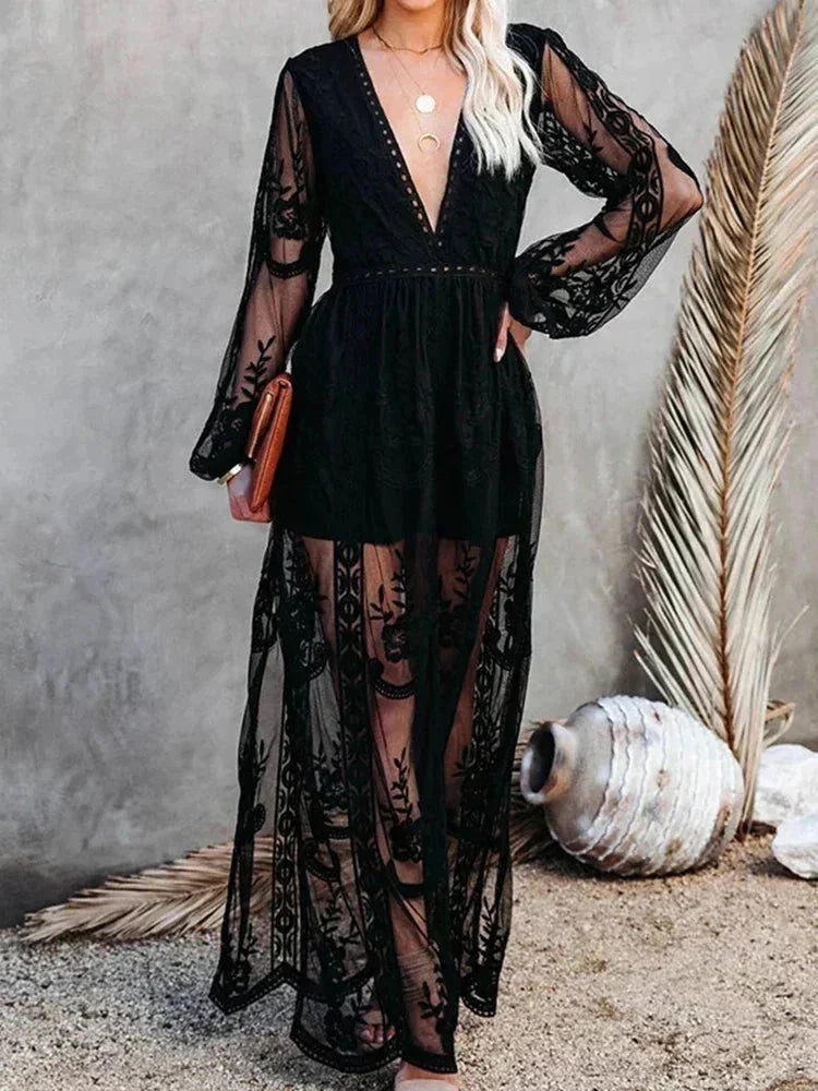 Women’s sheer lace maxi dress featuring a deep V-neck and long sleeves, crafted from delicate, lightweight lace fabric.