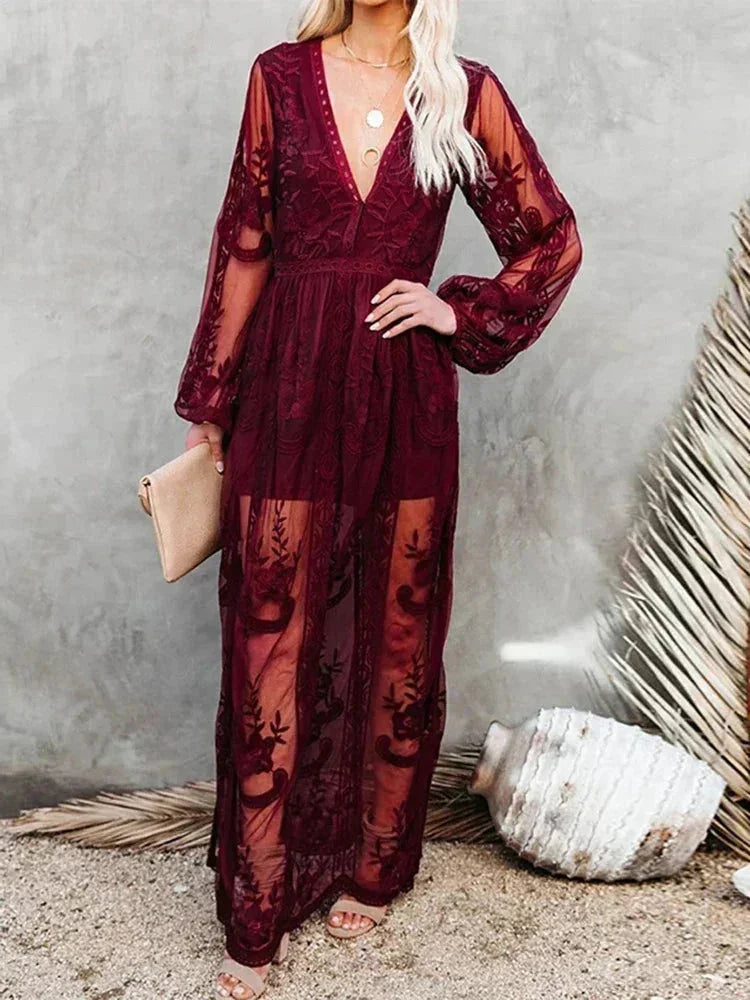 Women's sheer lace maxi dress featuring a deep V-neck, long sleeves, and intricate lace detailing for an elegant look.