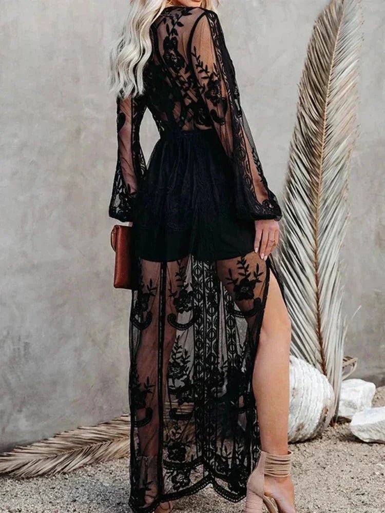 Women’s sheer lace maxi dress featuring a deep V-neck, long sleeves, and delicate floral patterns for an elegant look.