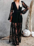 Black women's sheer lace maxi dress featuring a deep V-neck, long sleeves, and delicate floral patterns throughout.
