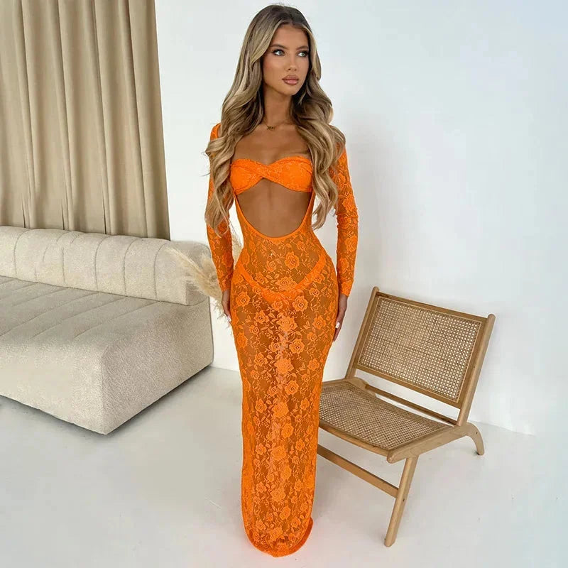 Orange sheer lace maxi dress featuring front cutouts and a flowing silhouette, perfect for summer events.