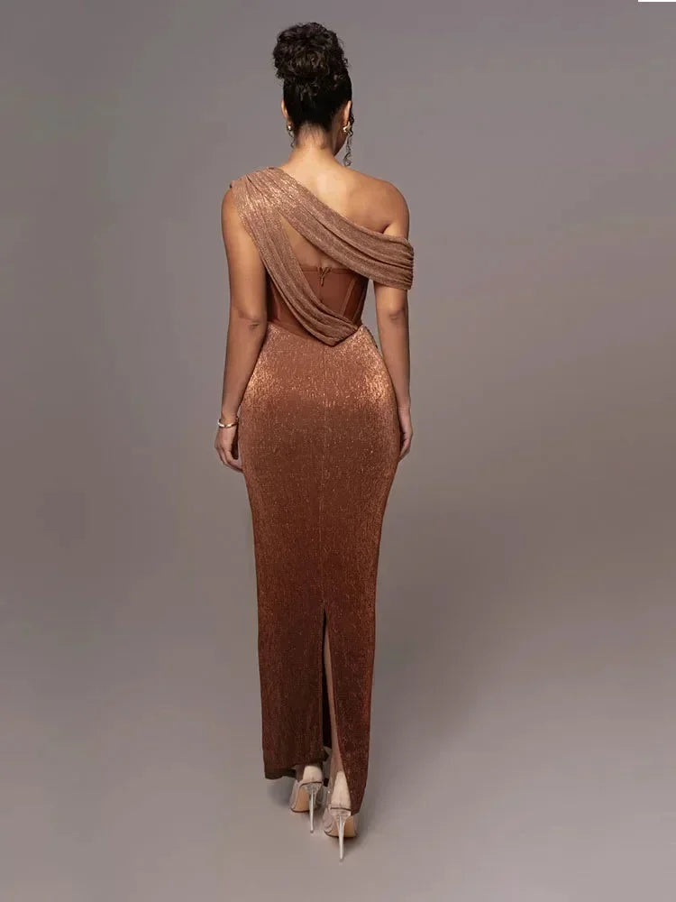 Women’s asymmetric evening maxi dress featuring a draped neckline and shimmering fabric for a stylish, elegant look.