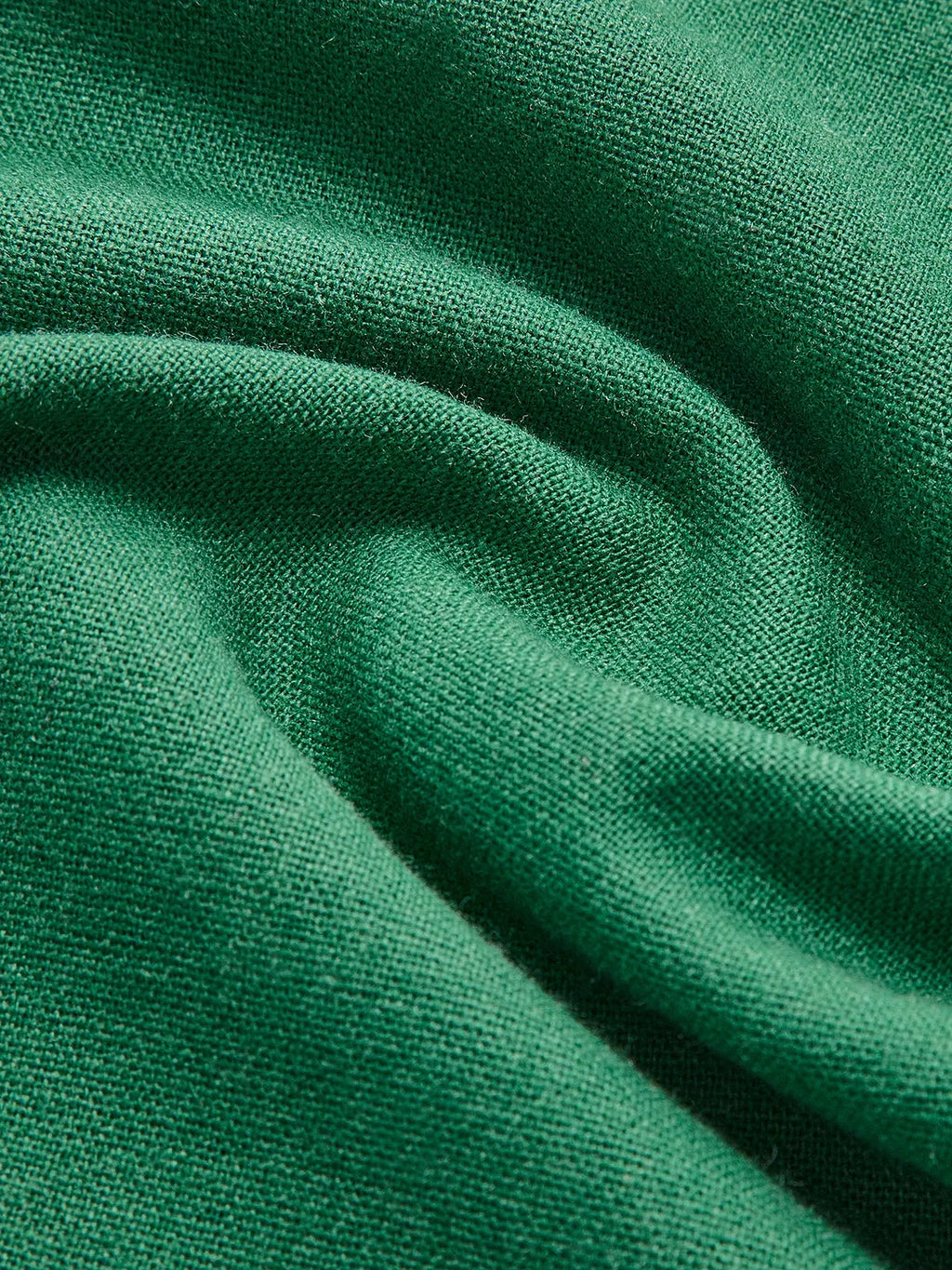 Women’s sleeveless A-line midi dress in breathable fabric, featuring a stylish side slit and a flattering silhouette.