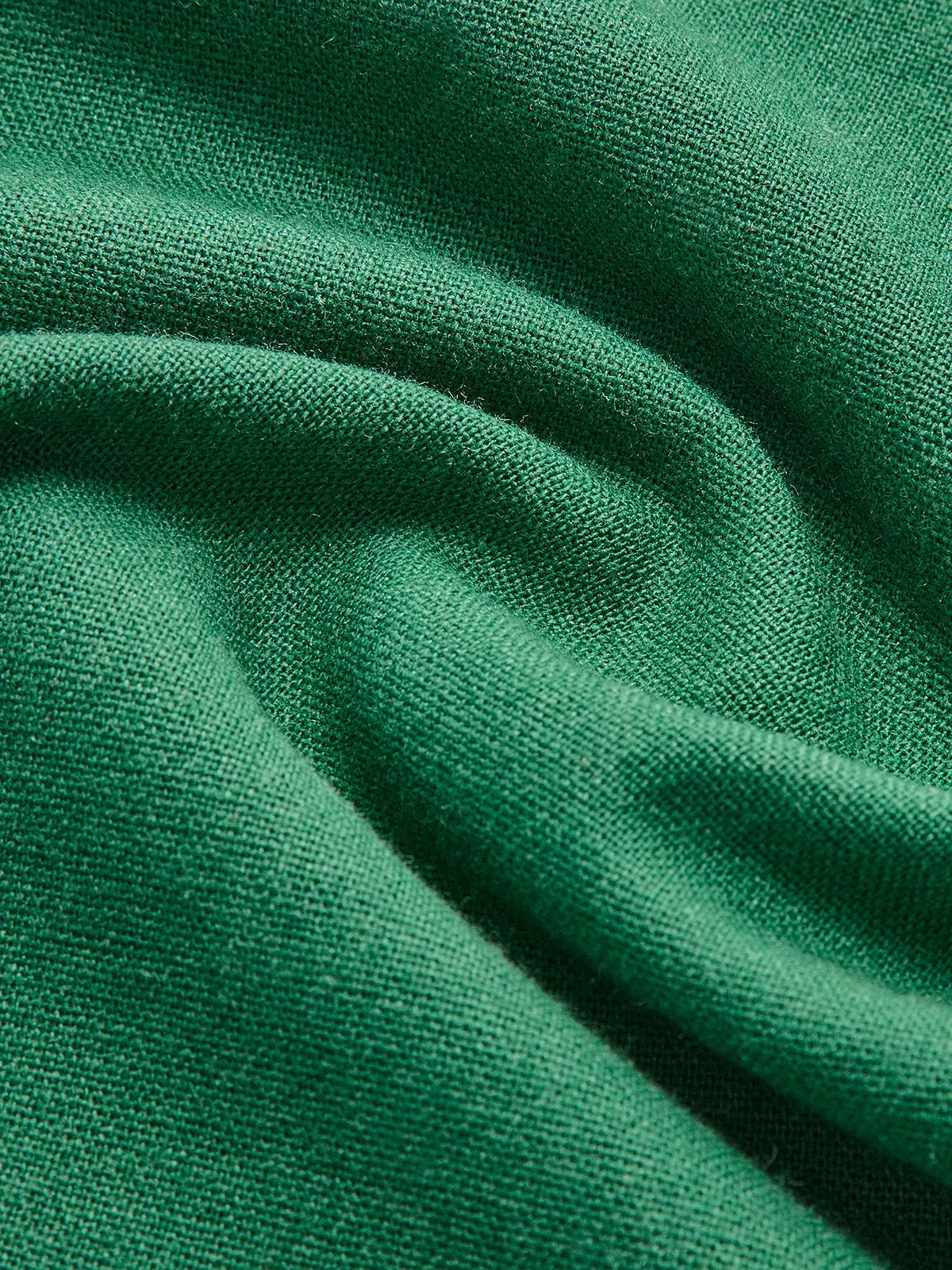 Women’s sleeveless A-line midi dress in breathable fabric, featuring a stylish side slit and a flattering silhouette.