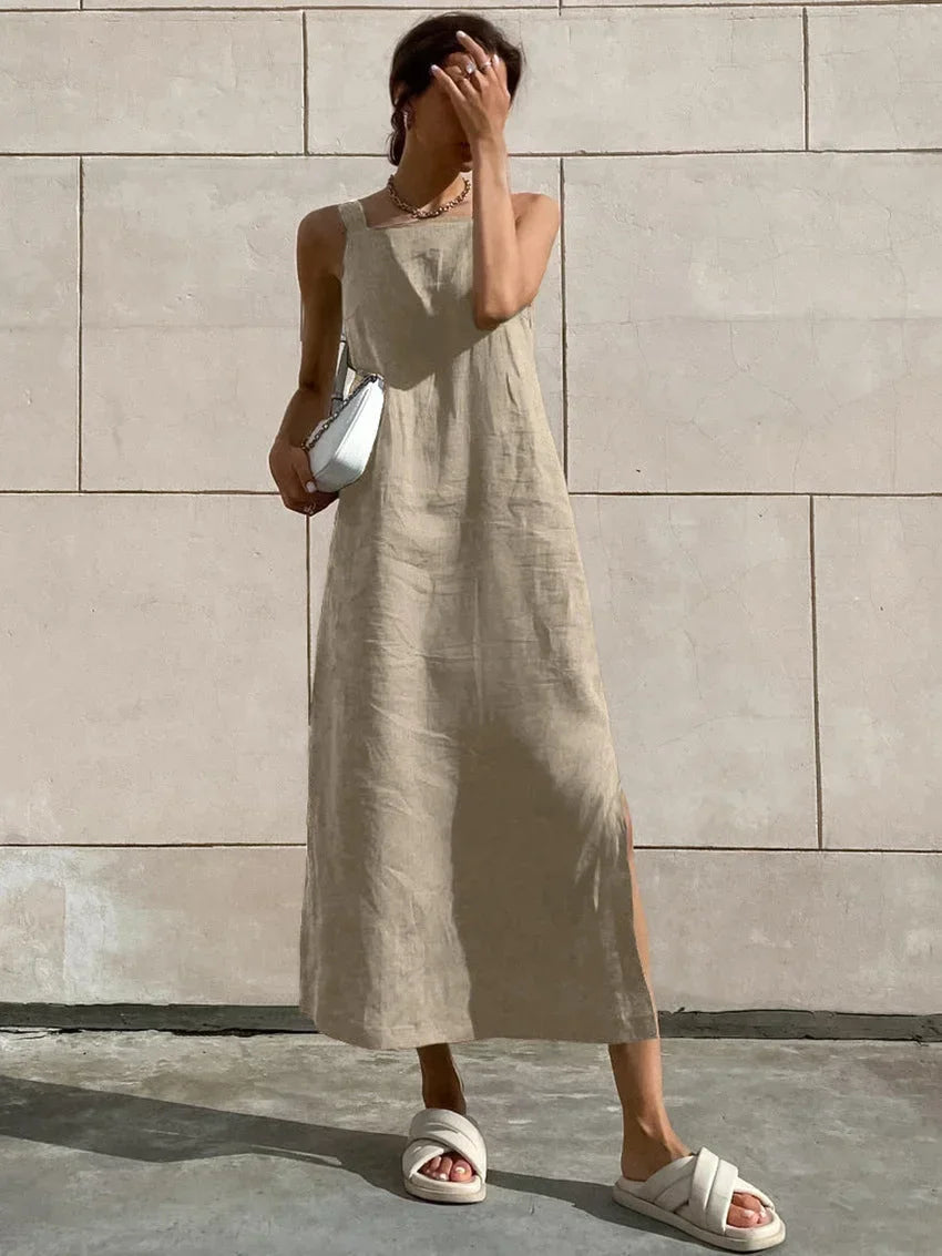Khaki sleeveless A-line midi dress with side slit, made of soft cotton blend for comfort and breathability.