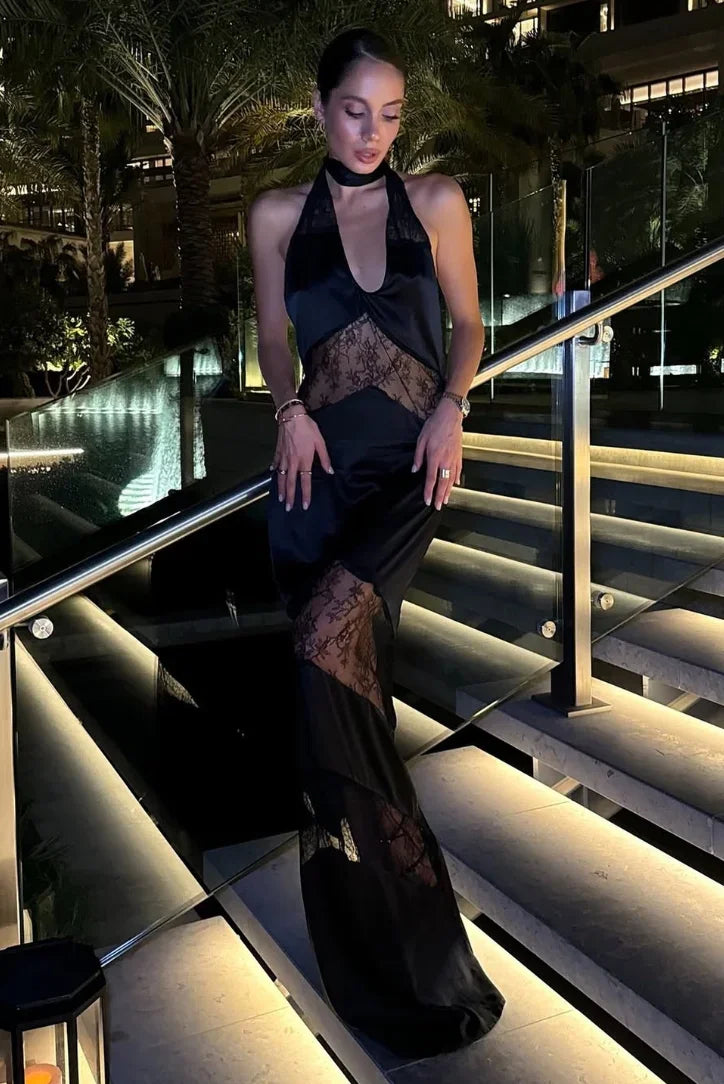 Women's sleeveless halter dress featuring lace panels and a choker design, crafted from lightweight fabric for comfort.