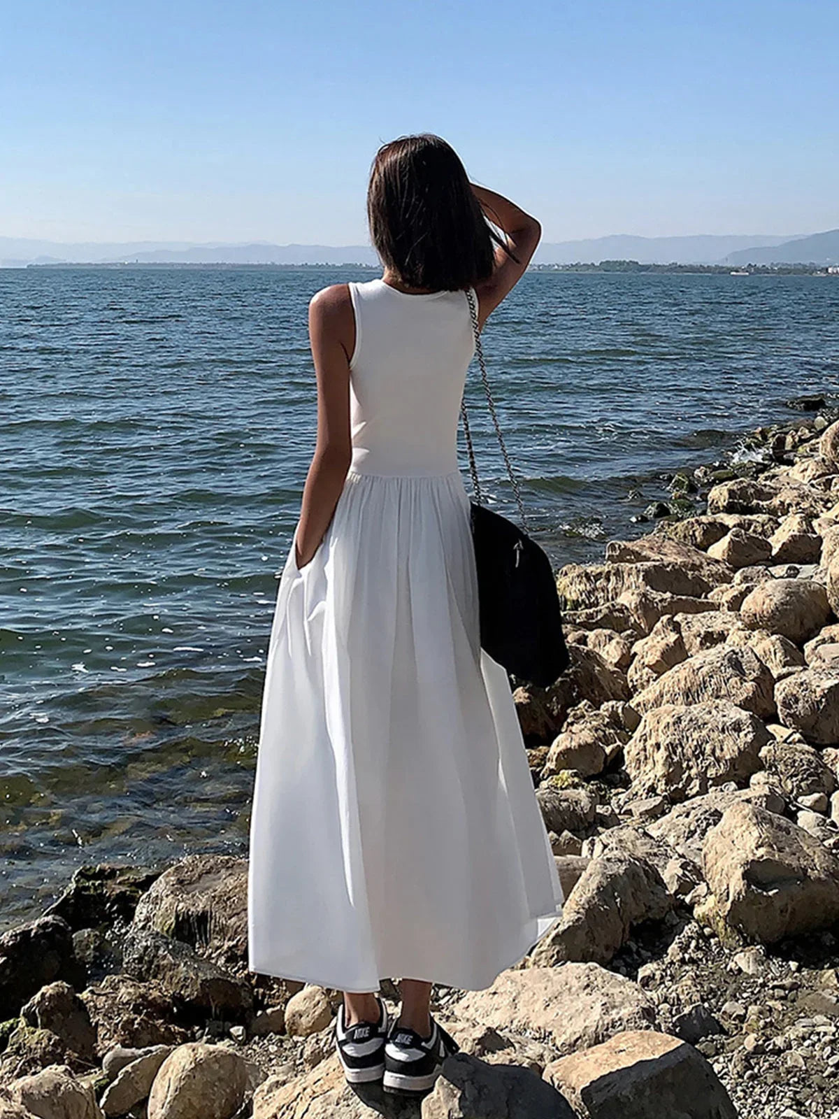 Women's sleeveless jersey midi dress with flowing skirt – Bahnhof Boutique
