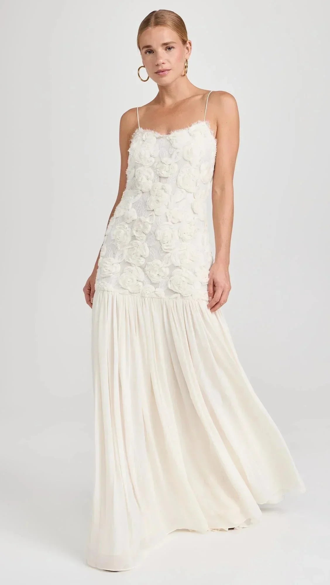 Women’s sleeveless maxi dress featuring delicate lace top and thin straps, crafted from soft, breathable fabric for comfort.