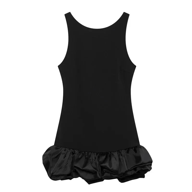 Black sleeveless mini dress with a ruffled hem, crafted from lightweight fabric for comfort and a flattering silhouette.