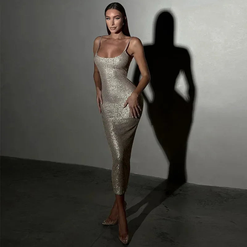 Sparkling fitted midi dress for women with spaghetti straps, crafted from stretchy fabric for a comfortable, flattering fit.