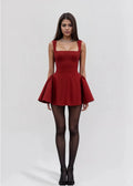Red women's skater mini dress with a square neckline, flared skirt, and soft fabric for a comfortable fit.