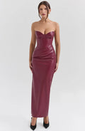 Burgundy strapless maxi dress featuring fitted silhouette and draped detailing, made from soft, breathable fabric for…