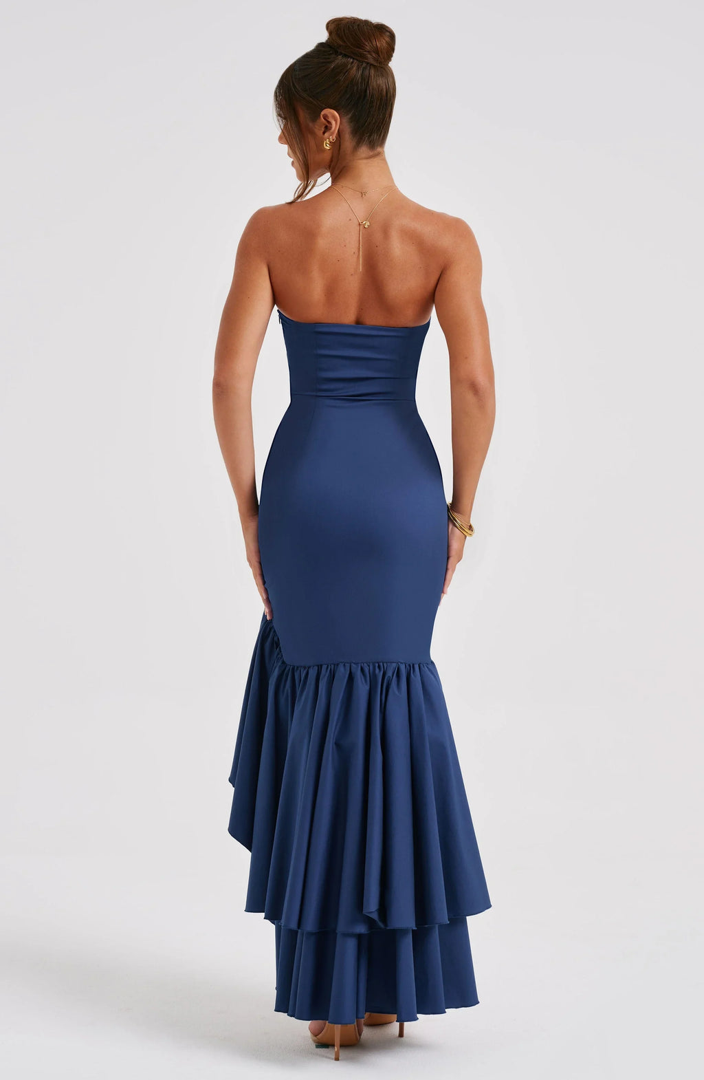 Women’s strapless midi dress with asymmetrical ruffle skirt, made of lightweight fabric for a flowy, stylish look.