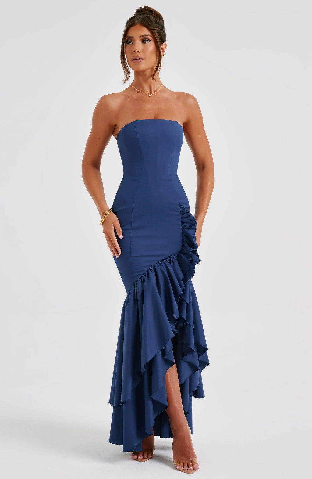 Women’s strapless midi dress featuring an asymmetrical ruffle skirt, crafted from lightweight fabric for comfortable wear.