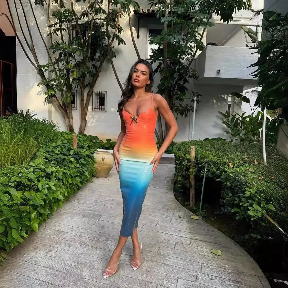 Women’s sunset ombre midi dress featuring starfish detail, spaghetti straps, and lightweight fabric for easy breezy wearing.