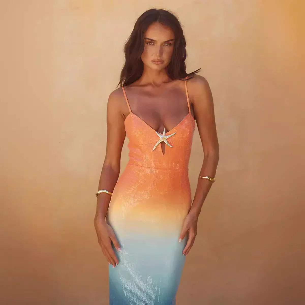 Women’s sunset ombre midi dress with starfish detail, made from soft fabric, featuring adjustable spaghetti straps and a…