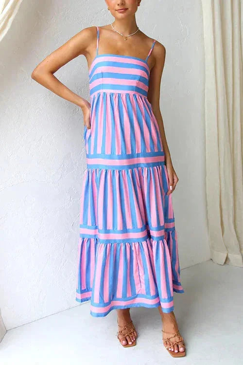 Blue women’s tiered midi dress featuring a strappy top and vertical stripes, made from lightweight cotton for comfort.