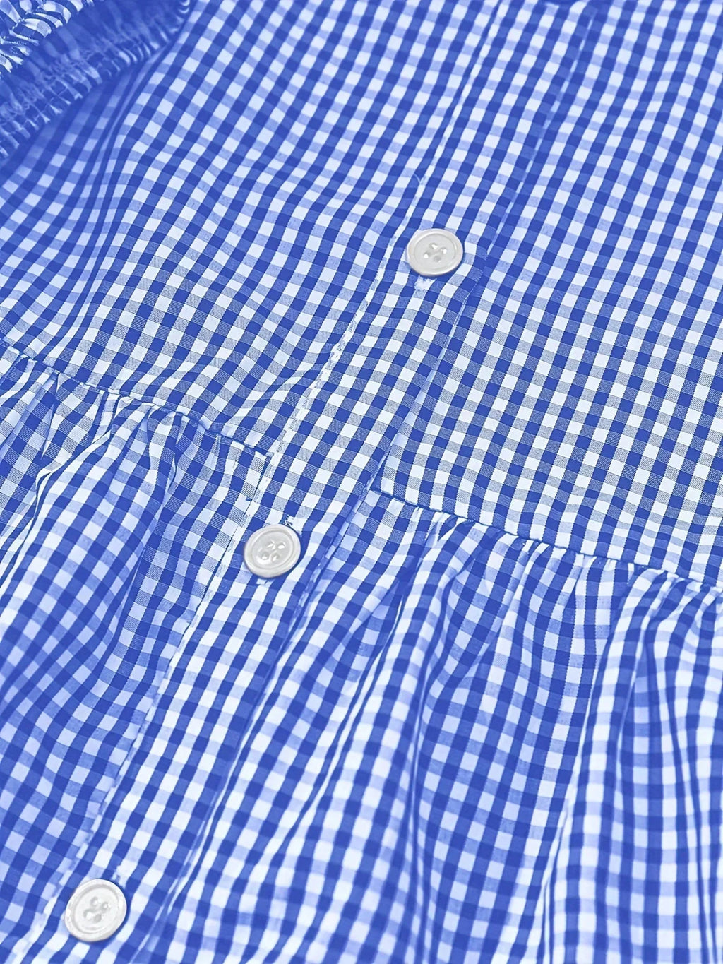 Women's tiered mini dress with button details, collar, and lightweight fabric, perfect for casual outings.