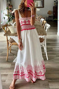 Women’s white maxi dress featuring pink tribal patterns, made from lightweight cotton fabric, perfect for warm weather…